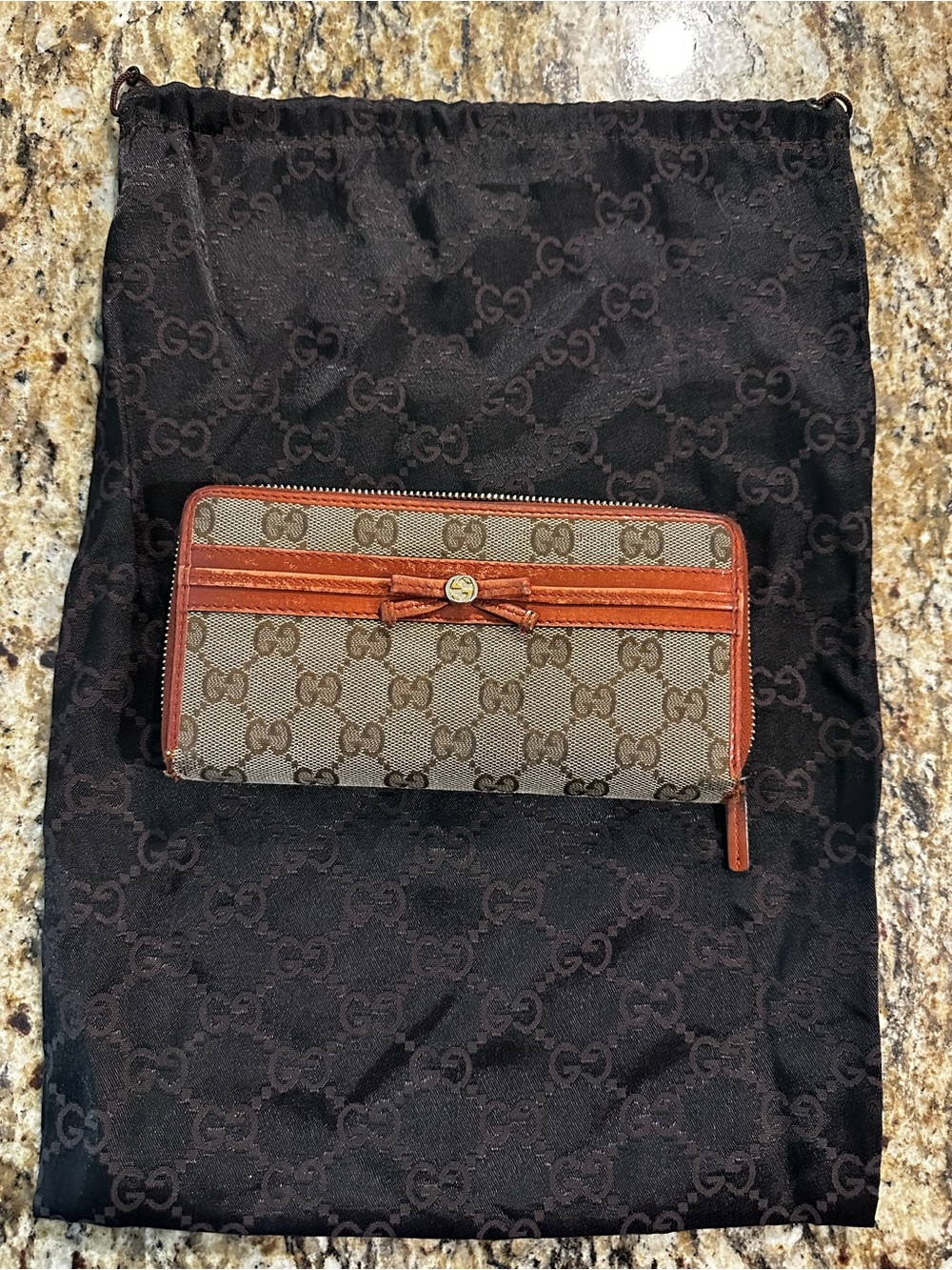 Gucci Brown/Tan GG Canvas Zip-Around Wallet with Leather Bow Trim
